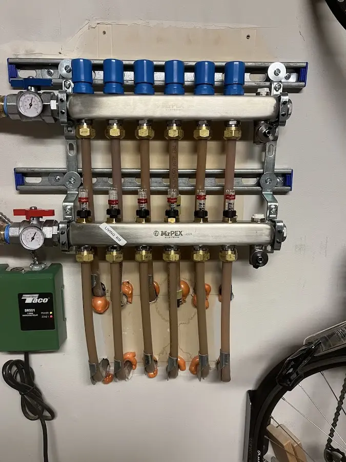 Plumber performing Gas Line Installation at a residential property in Ray